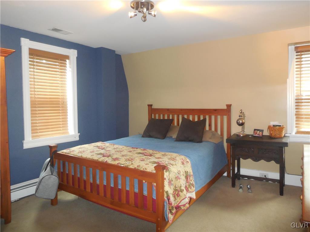 1425 North Brookside Road Lower Macungie Township, PA 18106 - Photo 22 of 31 a bedroom with a bed and a window