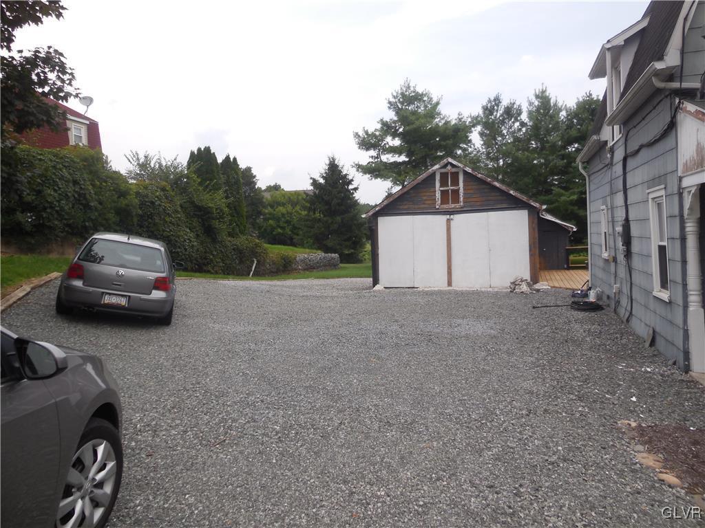 1425 North Brookside Road Lower Macungie Township, PA 18106 - Photo 26 of 31 a view of a car parked in front of a house