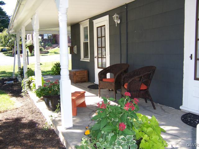 1425 North Brookside Road Lower Macungie Township, PA 18106 - Photo 4 of 31 a backyard of a house with outdoor seating