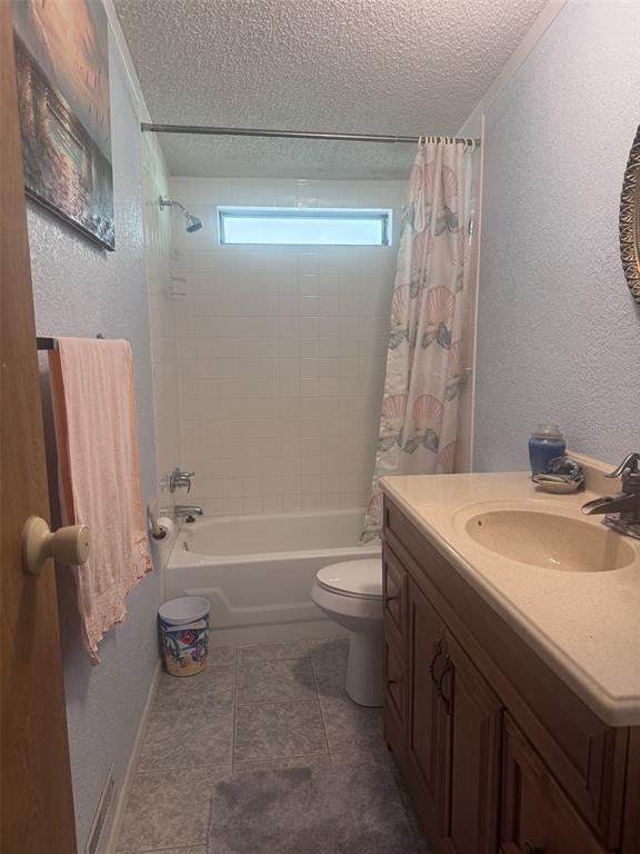 20050 Ruth Street Brooksville, FL 34601 - Photo 15 of 18 a bathroom with a sink toilet and shower