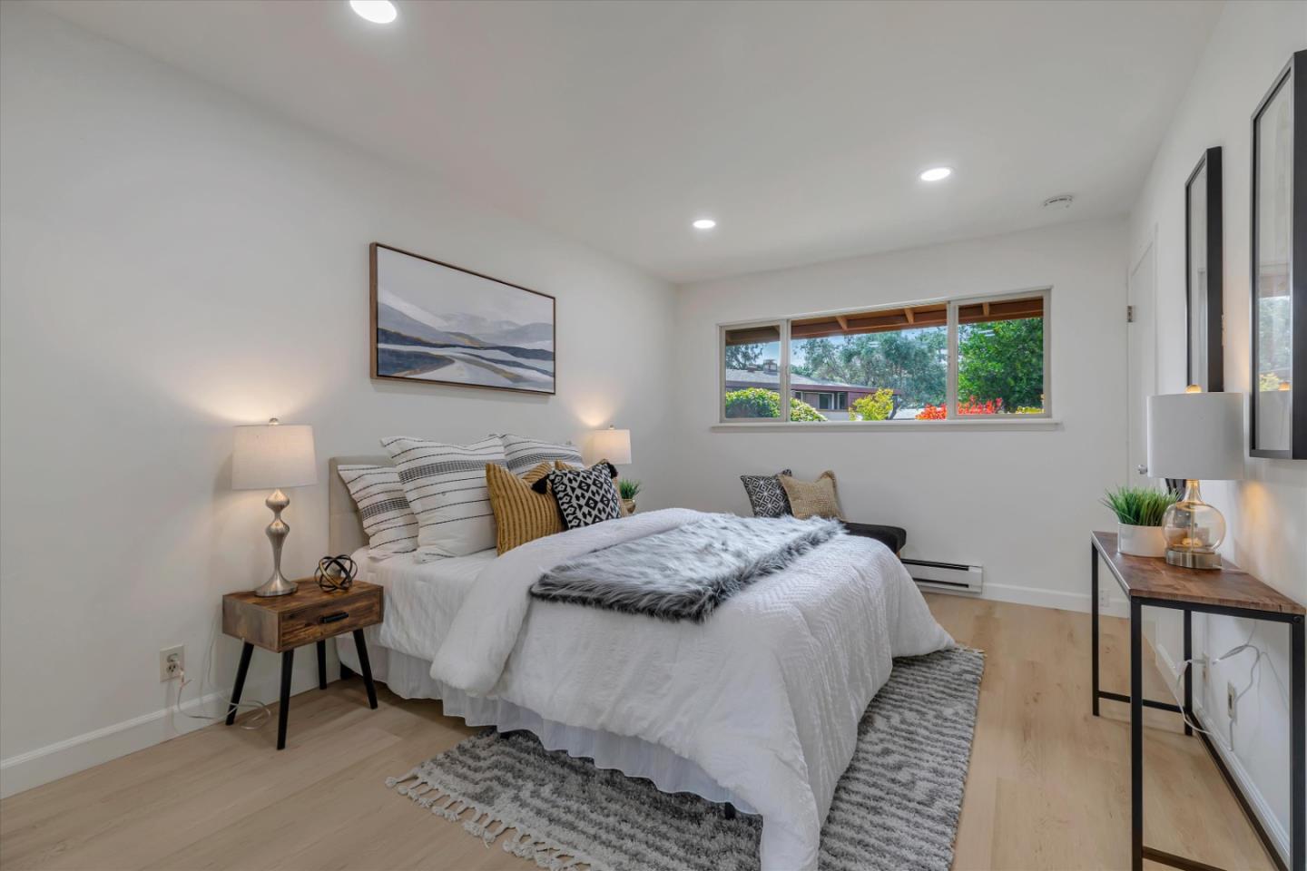 500 West Middlefield Road, Unit 142 Mountain View, CA 94043 - Photo 26 of 59 a bedroom with a bed and window