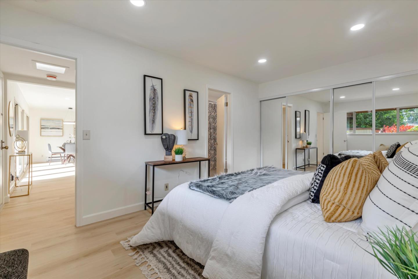 500 West Middlefield Road, Unit 142 Mountain View, CA 94043 - Photo 27 of 59 a bedroom with a bed and wooden floor