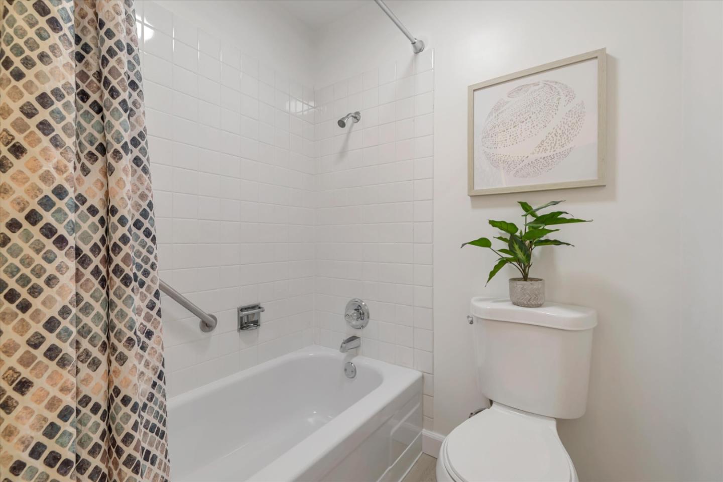 500 West Middlefield Road, Unit 142 Mountain View, CA 94043 - Photo 29 of 59 a white toilet sitting next to a white tub