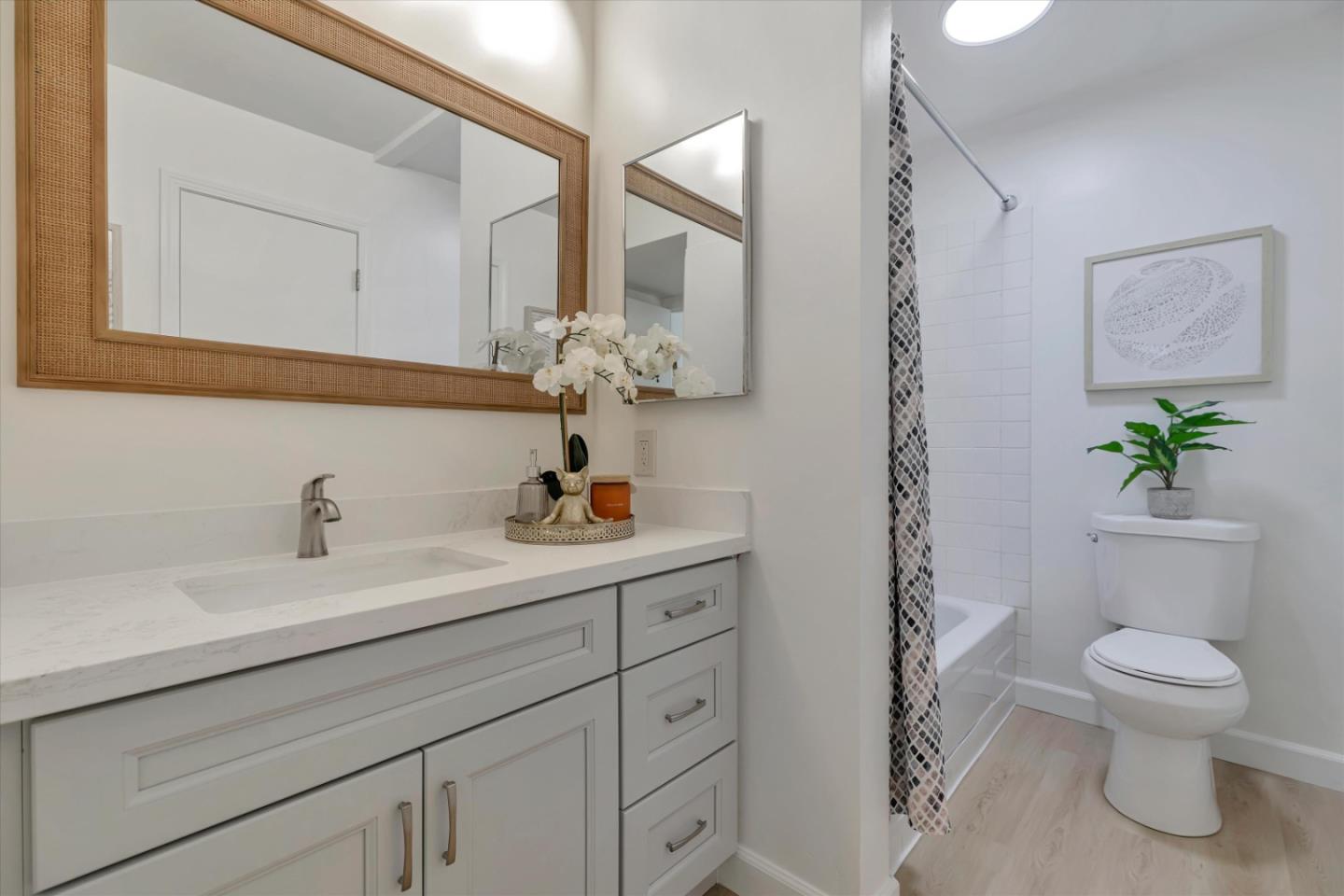 500 West Middlefield Road, Unit 142 Mountain View, CA 94043 - Photo 30 of 59 a bathroom with a toilet a sink and a mirror