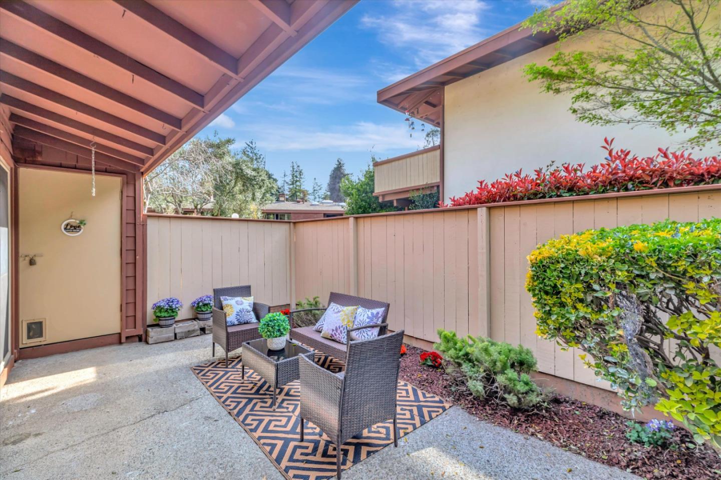 500 West Middlefield Road, Unit 142 Mountain View, CA 94043 - Photo 34 of 59 a view of a patio with couches table and chairs potted plants