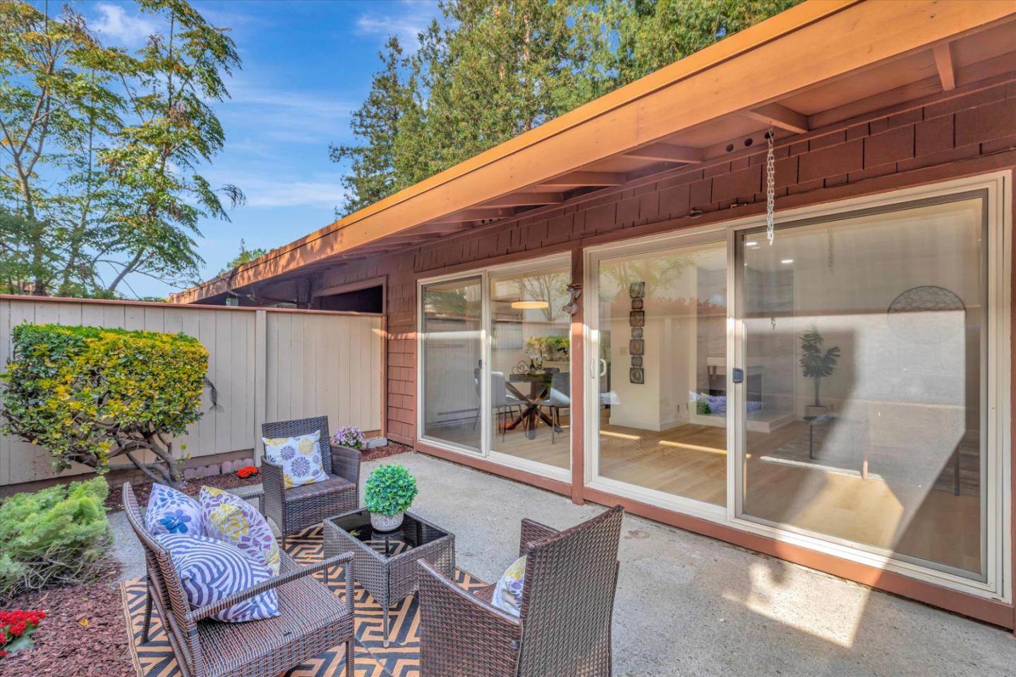 500 West Middlefield Road, Unit 142 Mountain View, CA 94043 - Photo 36 of 59 a backyard of a house with table and chairs