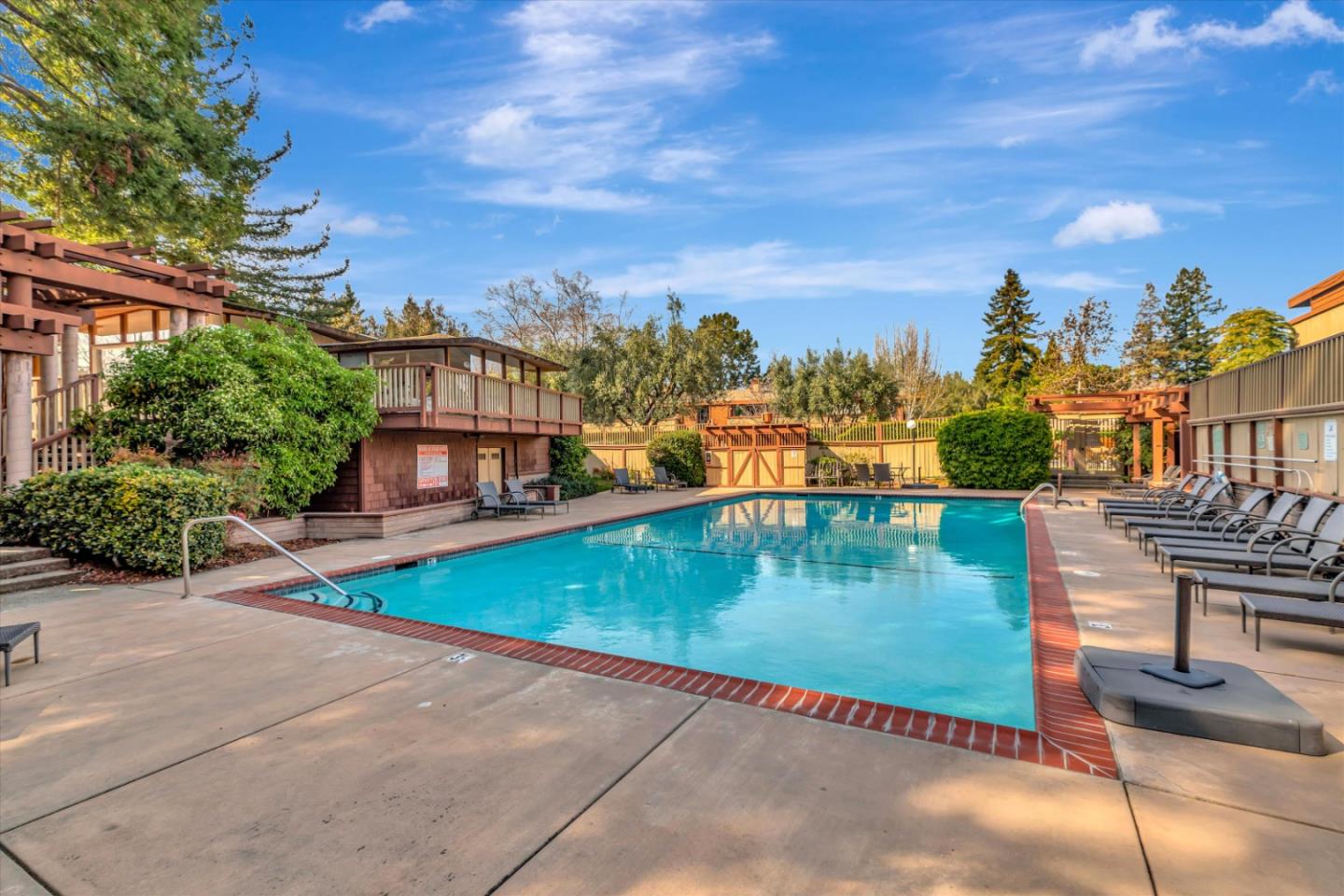 500 West Middlefield Road, Unit 142 Mountain View, CA 94043 - Photo 51 of 59 a view of a swimming pool with a lounge chairs