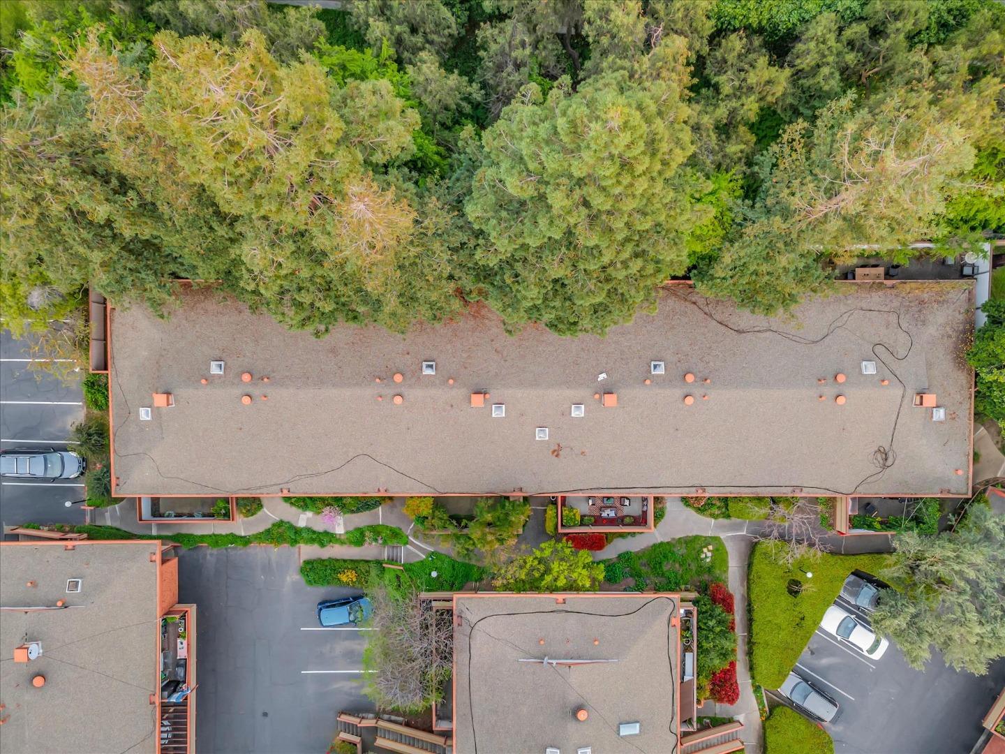 500 West Middlefield Road, Unit 142 Mountain View, CA 94043 - Photo 58 of 59 an aerial view of a house with a yard