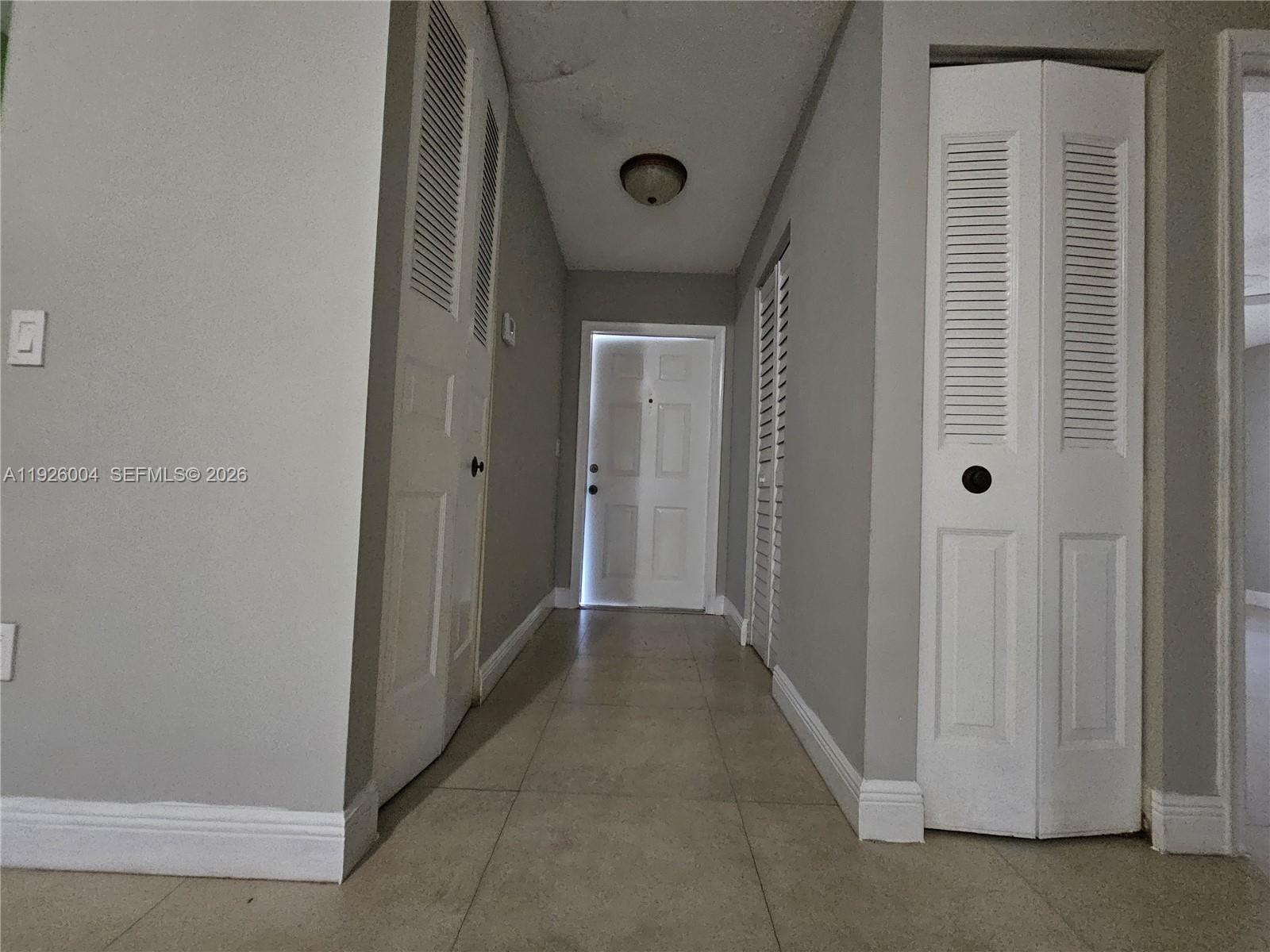 5317 Southwest 140th Place, Unit 5317 Miami, FL 33175 - Photo 24 of 30 a view of a hallway