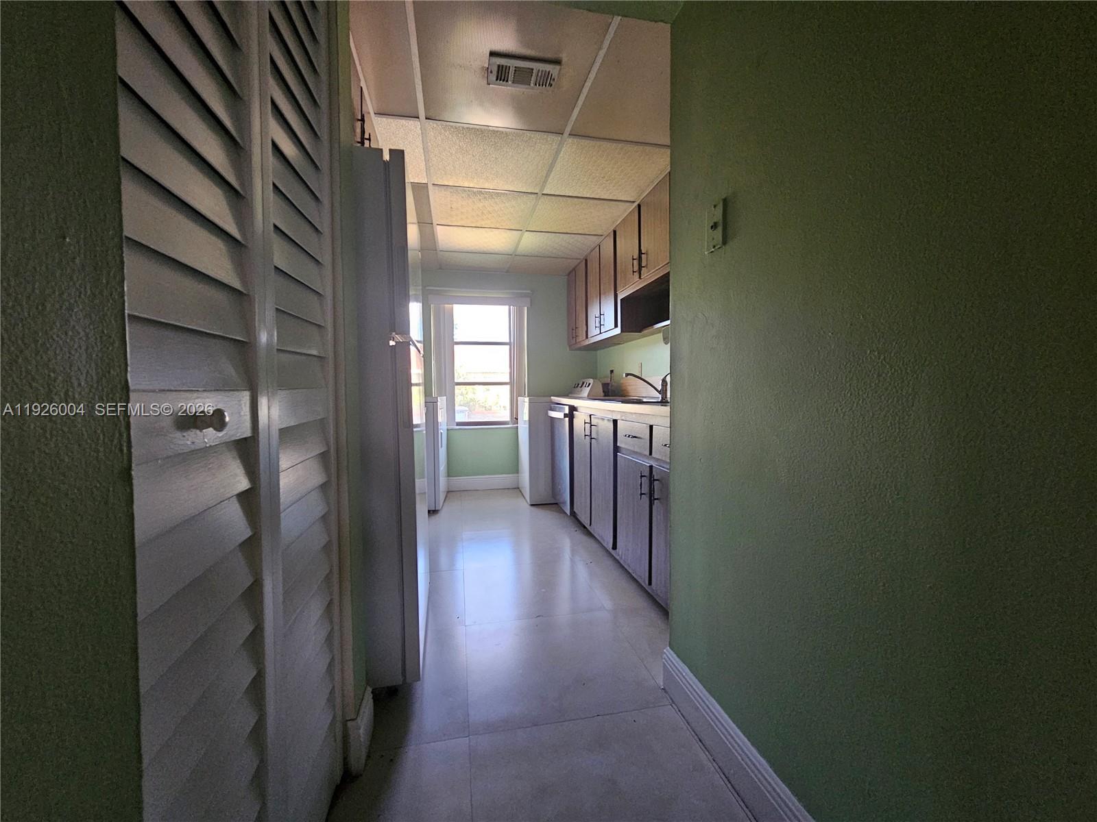 5317 Southwest 140th Place, Unit 5317 Miami, FL 33175 - Photo 5 of 30 a view of a hallway
