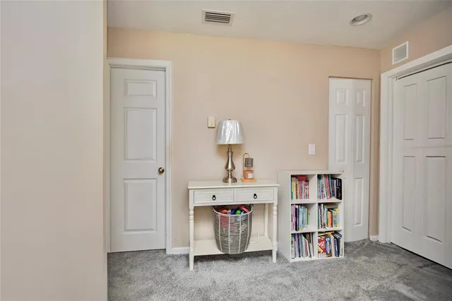 a room with a book shelf