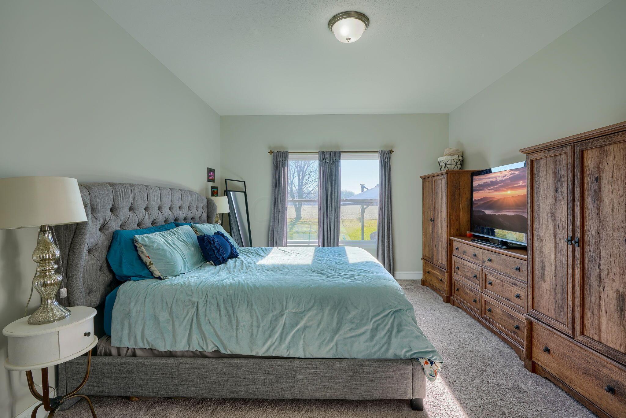 8050 Kilbourne Road Sunbury, OH 43074 - Photo 25 of 56 Bright First Floor Owner's Suite
