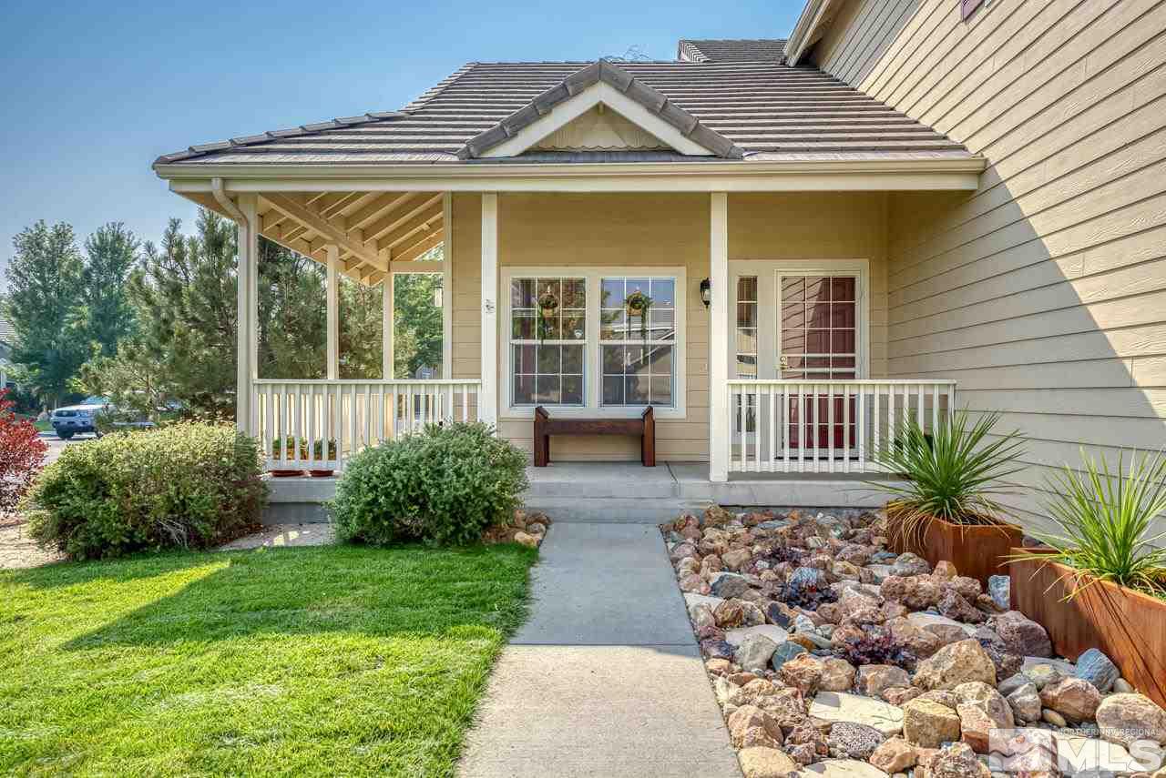 1650 Legacy Village Road Reno, NV 89521 - Photo 4 of 36 a front view of a house with garden