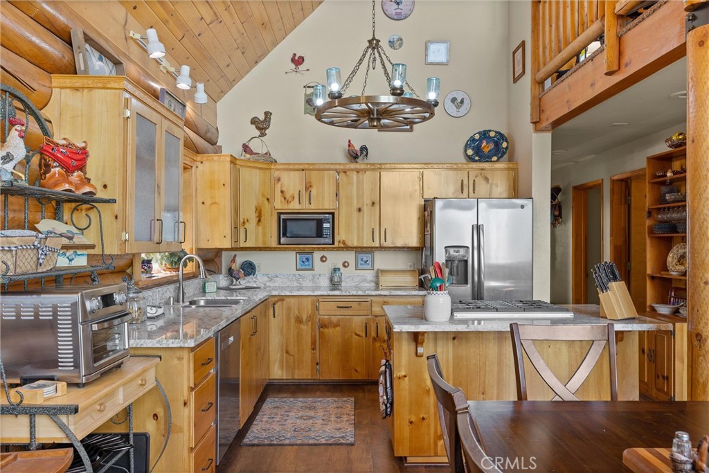 4592 Wendlis Road Forest Ranch, CA 95942 - Photo 14 of 64 a kitchen with stainless steel appliances a sink stove and cabinets