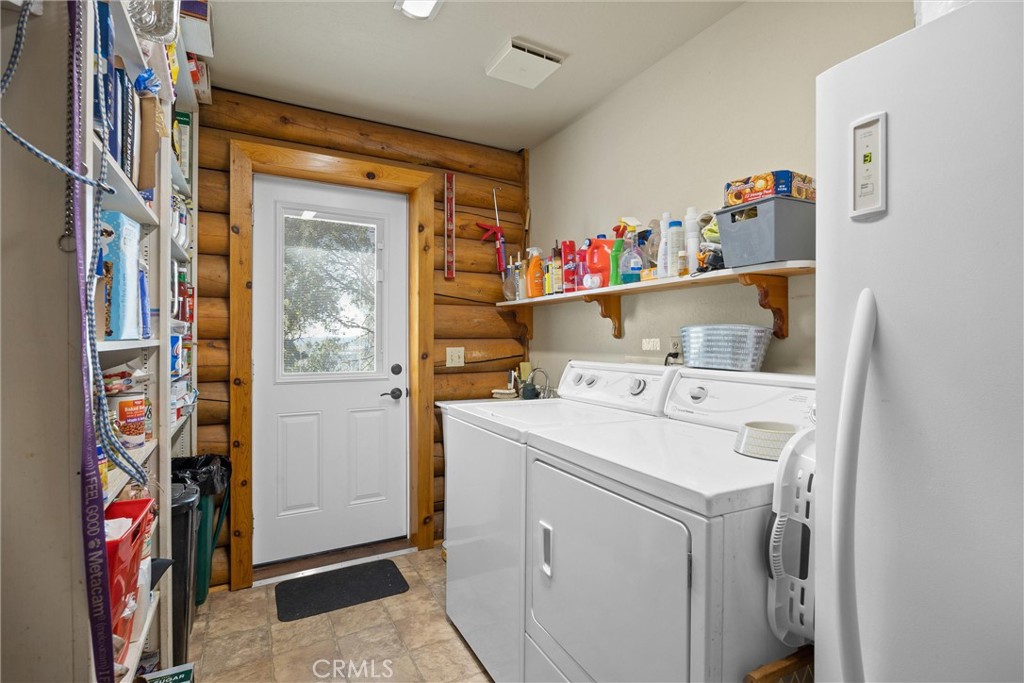 4592 Wendlis Road Forest Ranch, CA 95942 - Photo 39 of 64 a utility room with dryer and washer