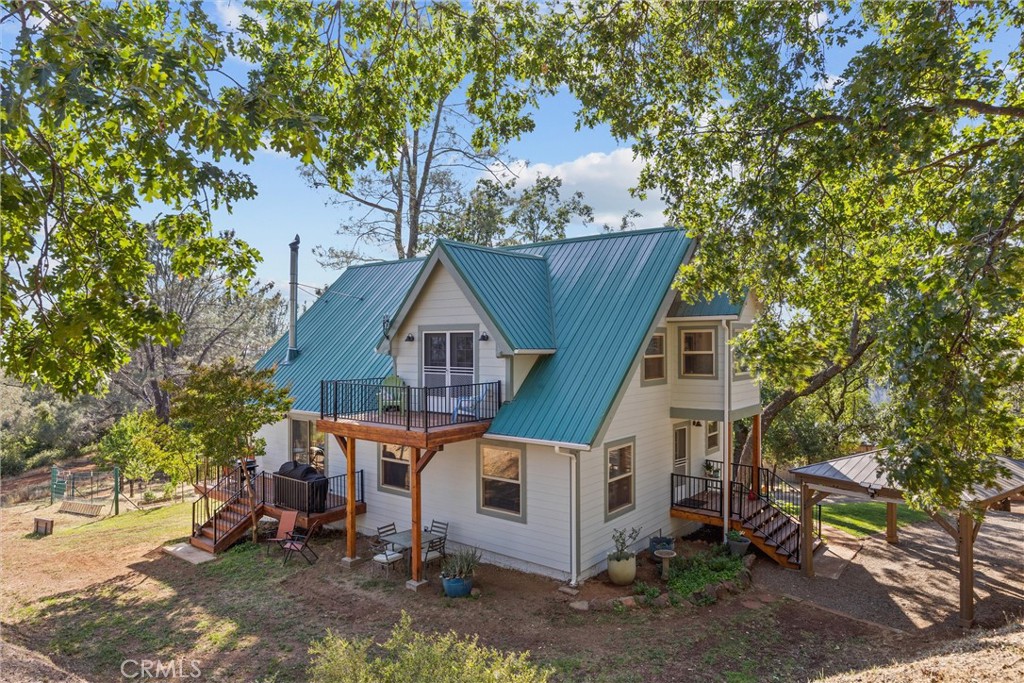 4592 Wendlis Road Forest Ranch, CA 95942 - Photo 43 of 64 a view of a house with a yard