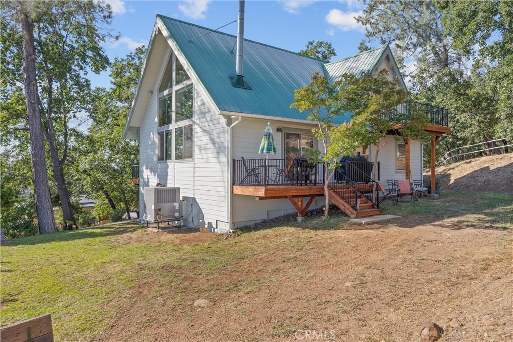 4592 Wendlis Road Forest Ranch, CA 95942 - Photo 45 of 64 a view of a house with patio