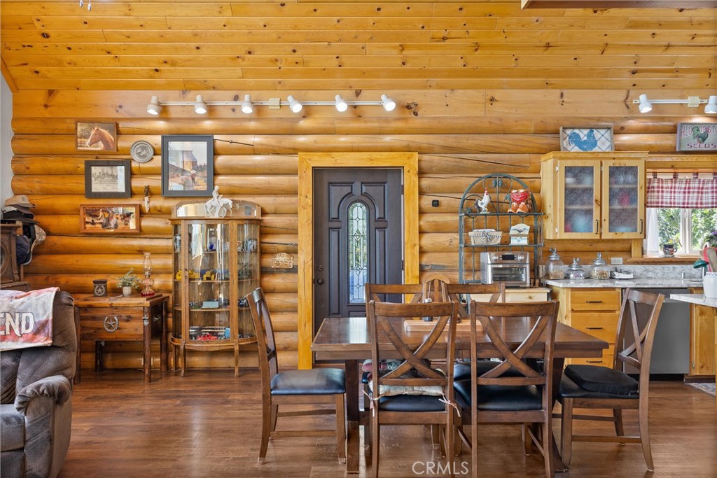 4592 Wendlis Road Forest Ranch, CA 95942 - Photo 9 of 64 a view of a dining room with furniture and wooden floor