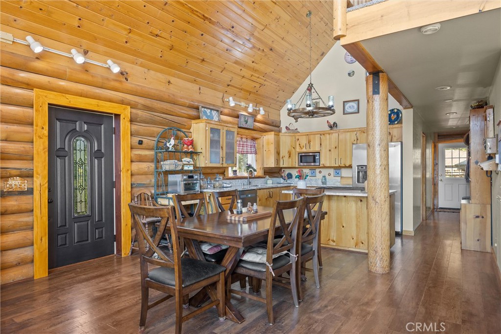 4592 Wendlis Road Forest Ranch, CA 95942 - Photo 10 of 64 a dining room with furniture and wooden floor