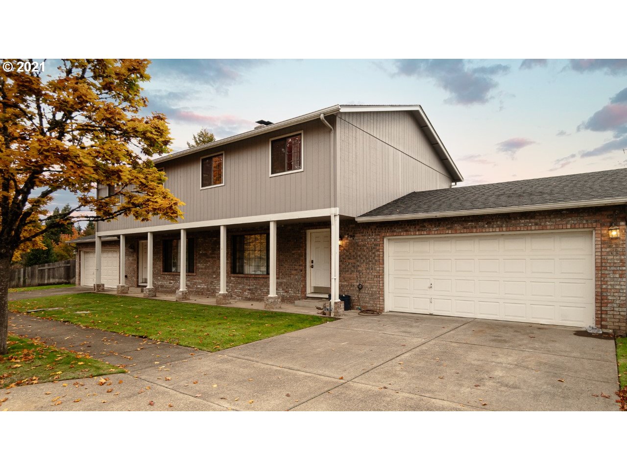 830 Janus Street Springfield, OR 97477 - Photo 2 of 11 a black white house with a outdoor space