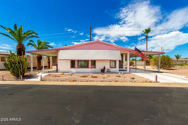 a front view of a house with a ocean view