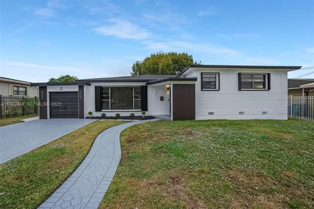 a house view with a garden space