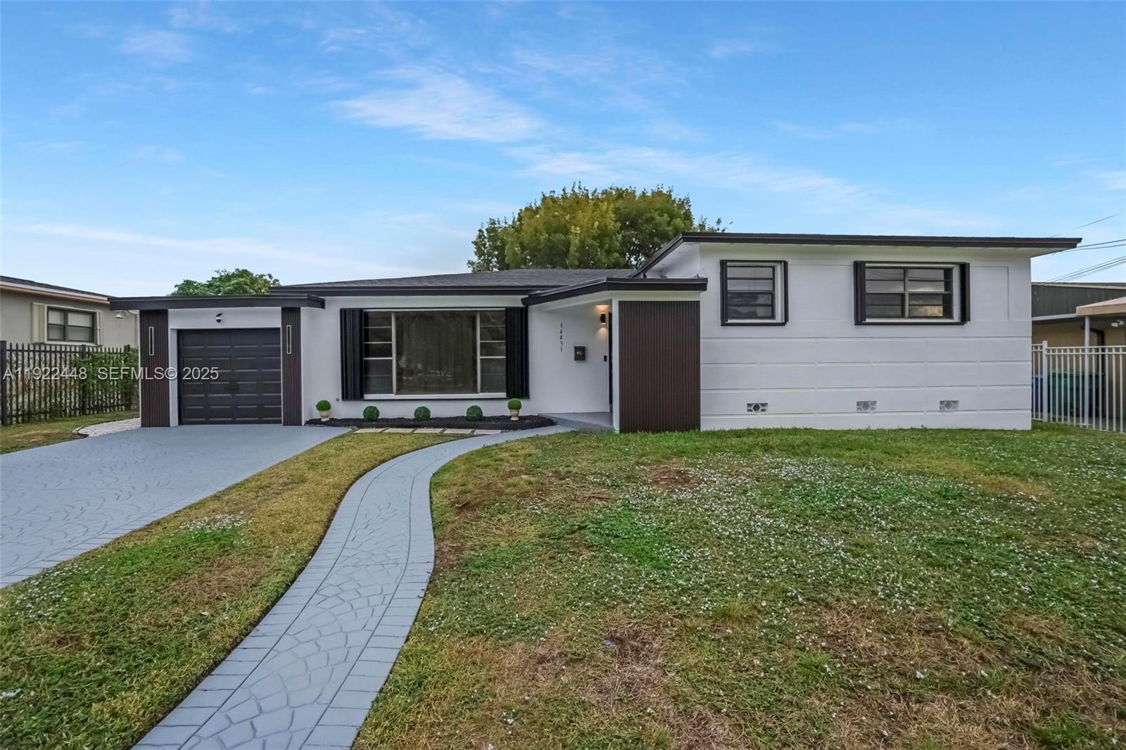 a house view with a garden space