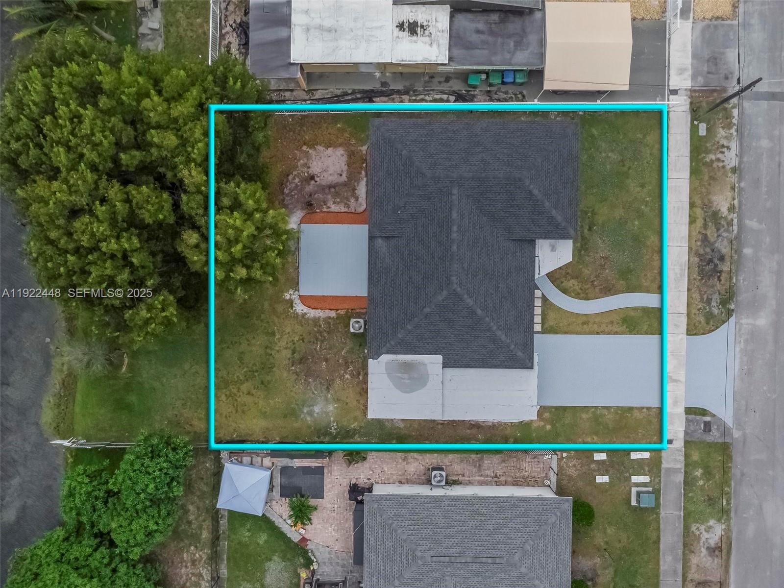 14431 Northwest 13th Road Miami, FL 33167 - Photo 35 of 39 an aerial view of a house with a yard