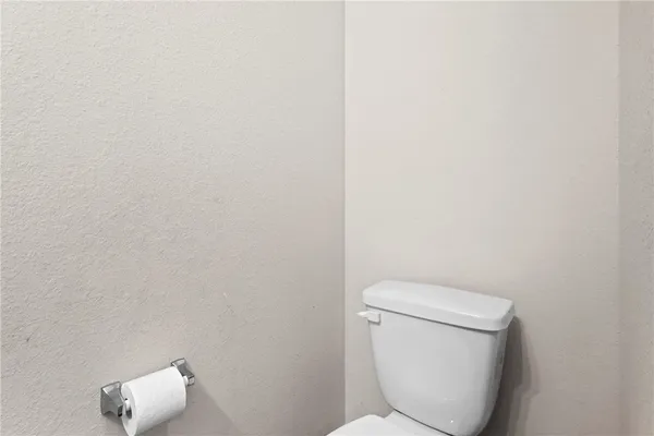 a bathroom with a sink a mirror and vanity