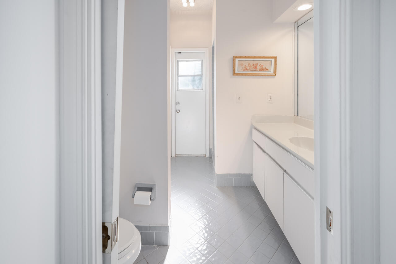 3740 Canterbury Way Boca Raton, FL 33434 - Photo 39 of 55 a bathroom with a sink and a toilet