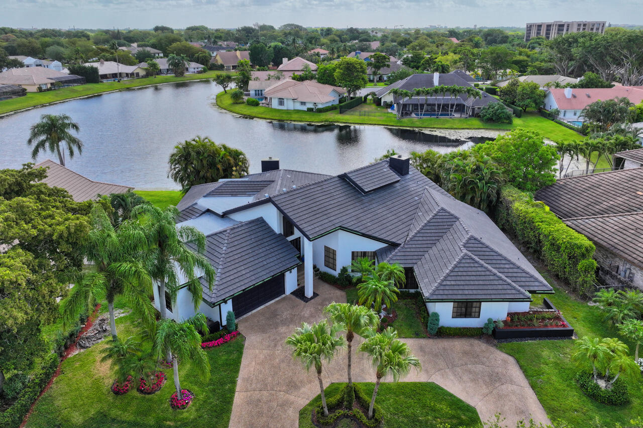 3740 Canterbury Way Boca Raton, FL 33434 - Photo 53 of 55 an aerial view of house with yard and lake view