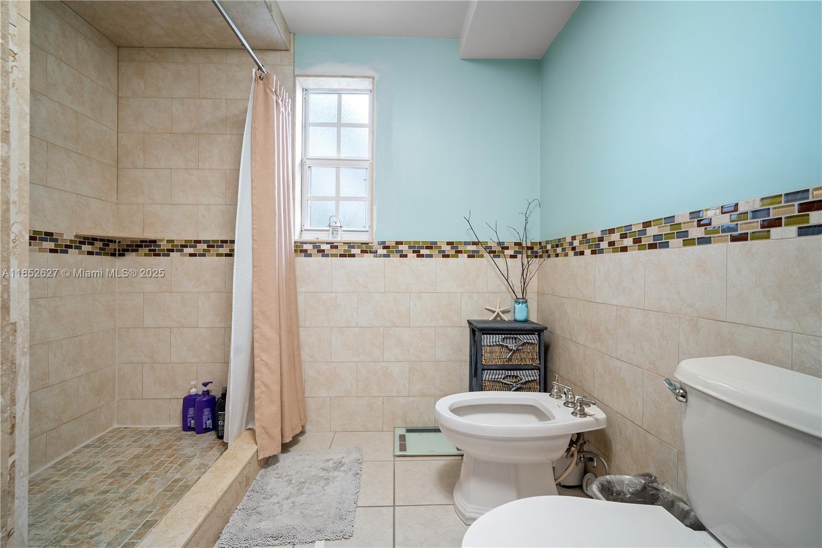 29001 Southwest 157th Avenue Homestead, FL 33033 - Photo 19 of 23 a bathroom with a toilet a sink and shower