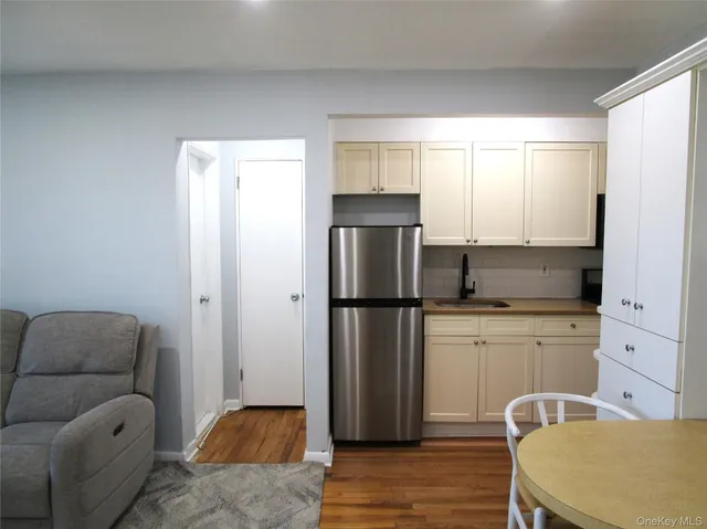 a view of livingroom with furniture and wooden floor