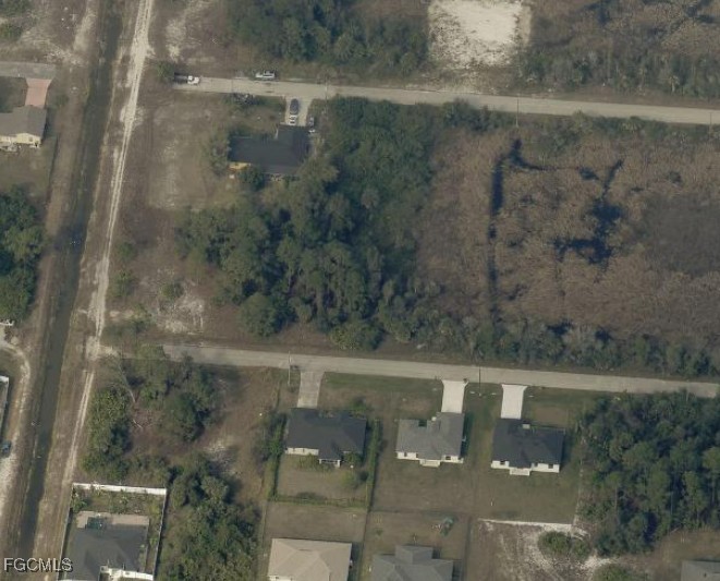 3418 39th Street Southwest Lehigh Acres, FL 33976 - Photo 9 of 10 a view of a bathroom with a shower