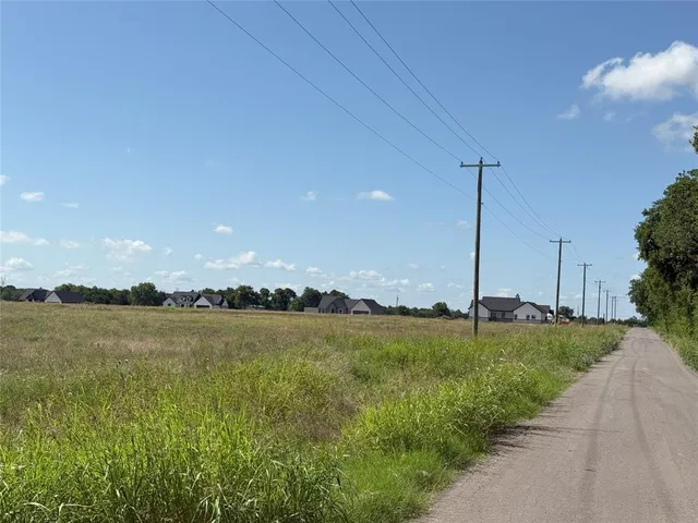 a view of a lake in middle of the house