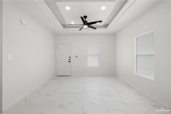 an empty room with windows
