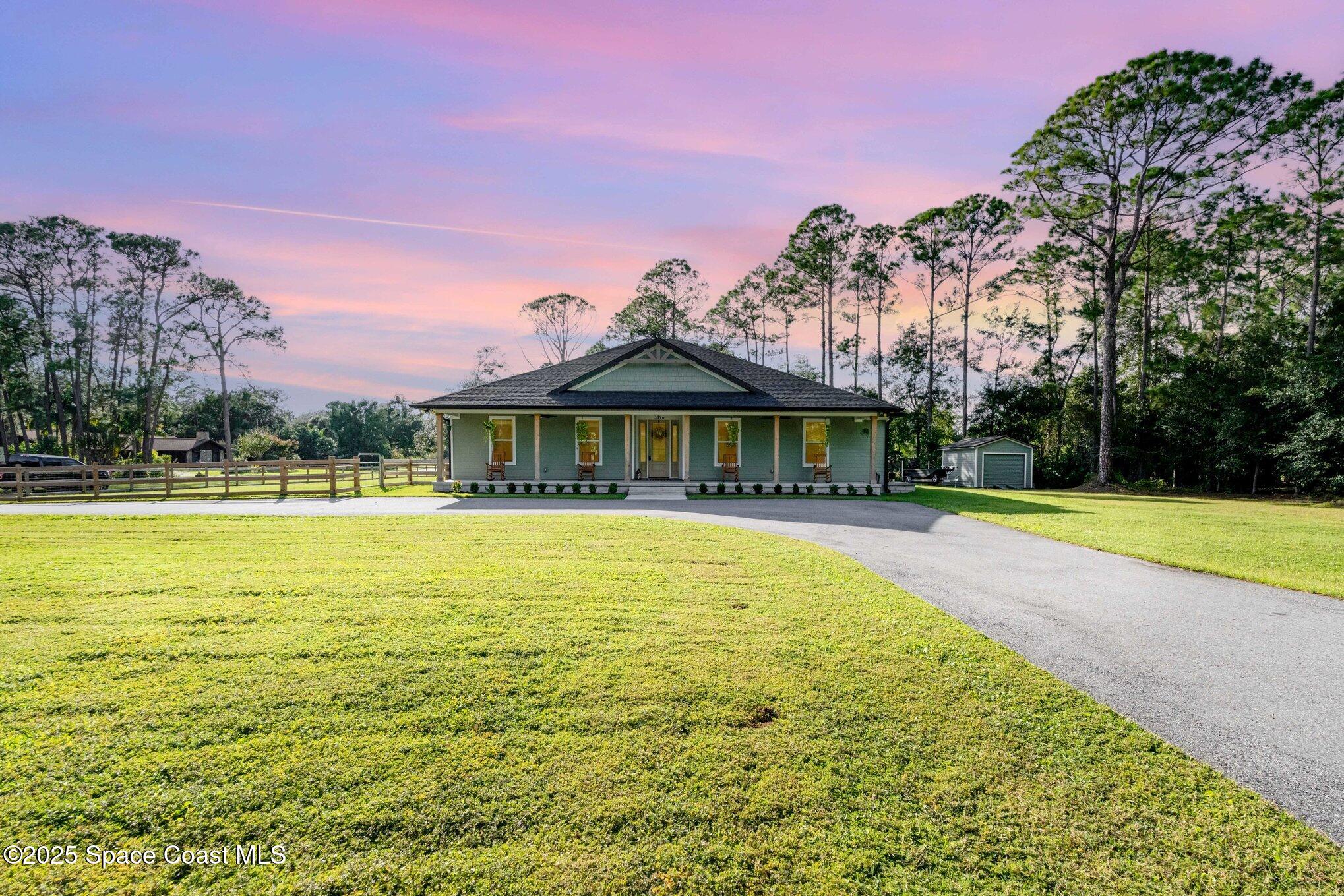 a view of a house with a swimming pool