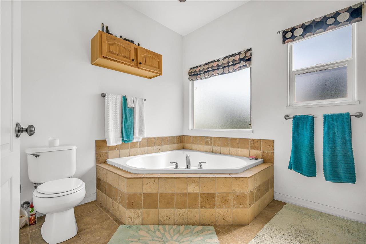 1356 Saddle Ridge Road Loma, CO 81524 - Photo 20 of 37 a bathroom with a tub and a toilet