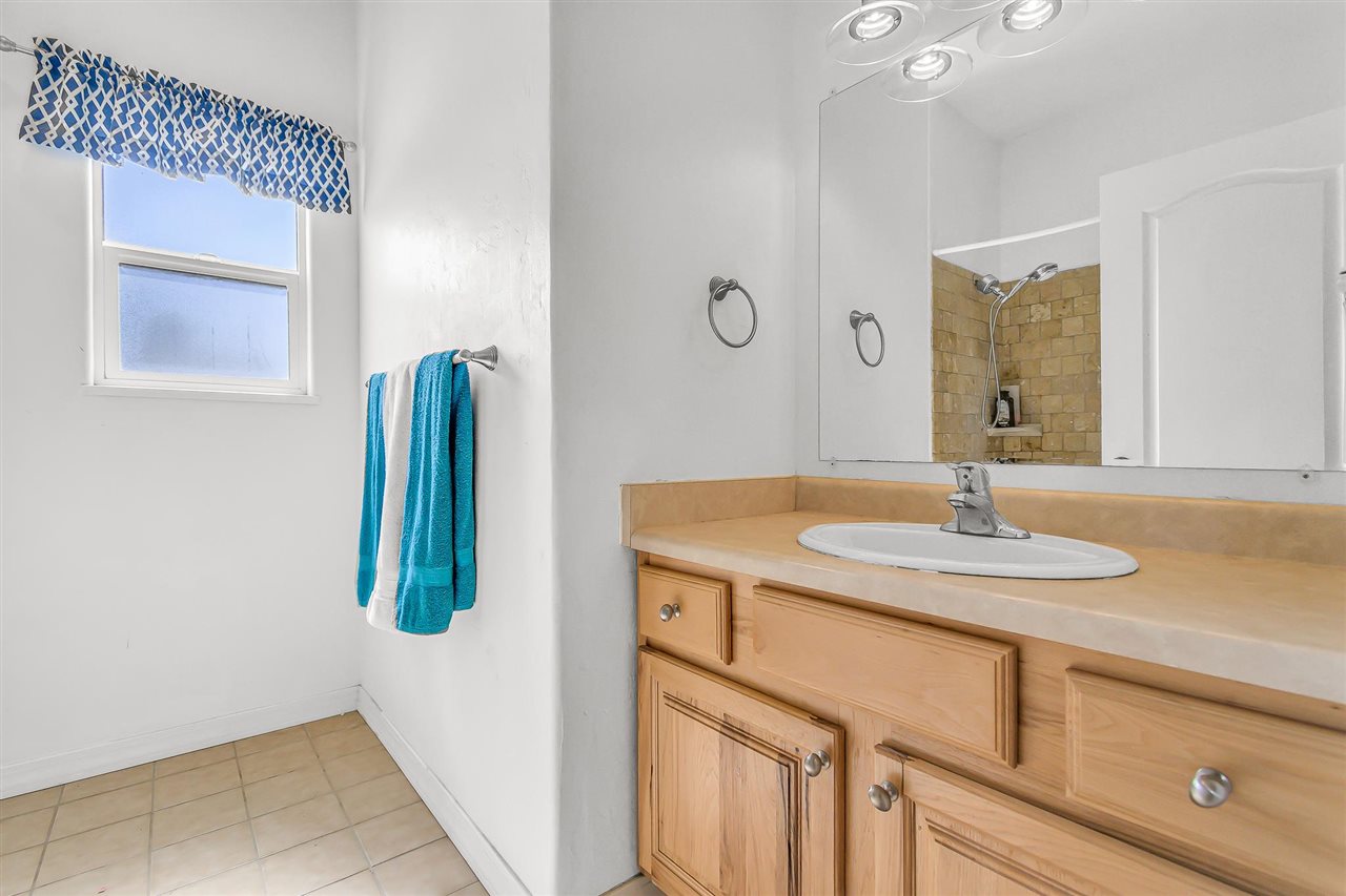 1356 Saddle Ridge Road Loma, CO 81524 - Photo 24 of 37 a bathroom with a sink and a mirror