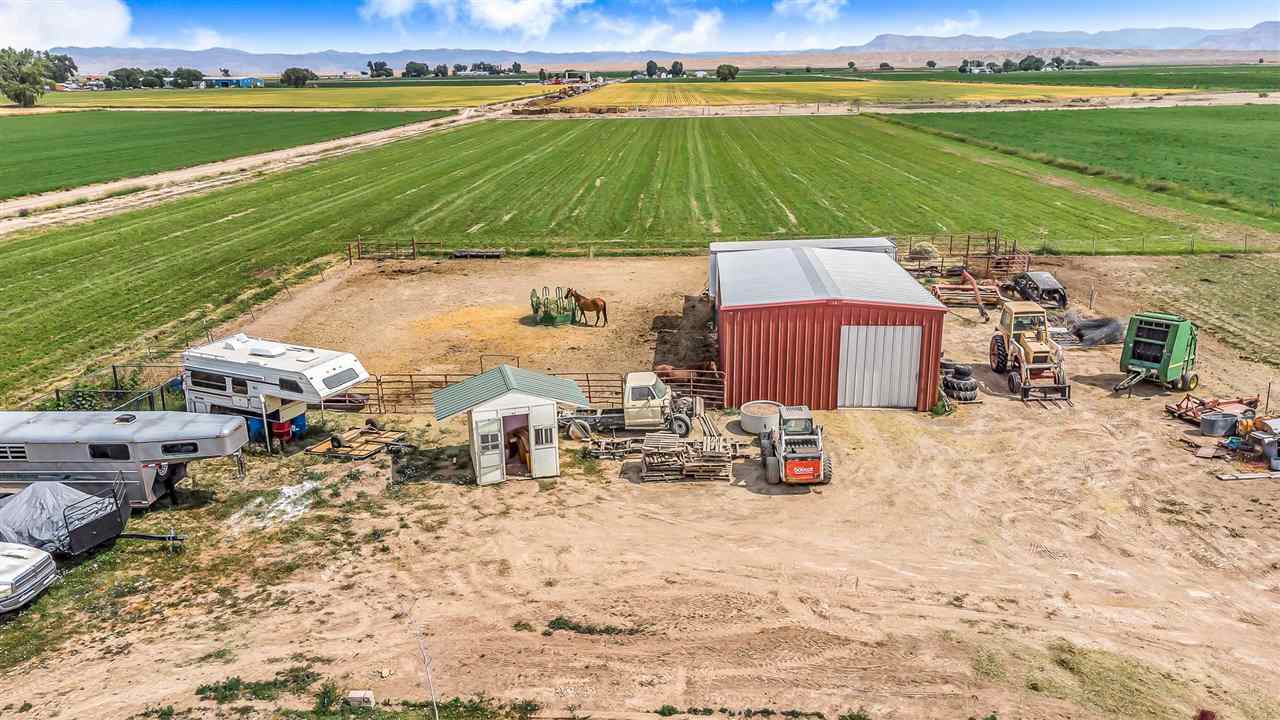 1356 Saddle Ridge Road Loma, CO 81524 - Photo 27 of 37 an outdoor space with furniture and a lake view