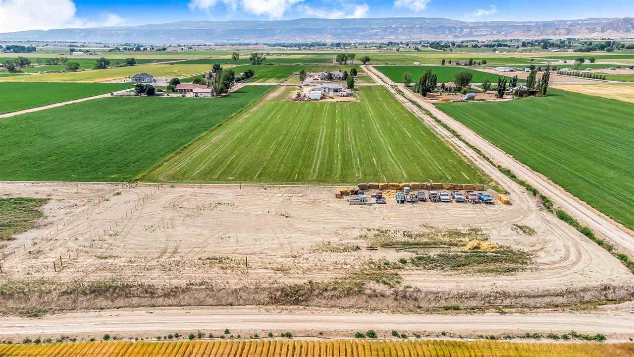 1356 Saddle Ridge Road Loma, CO 81524 - Photo 3 of 37 a view of a swimming pool with a yard