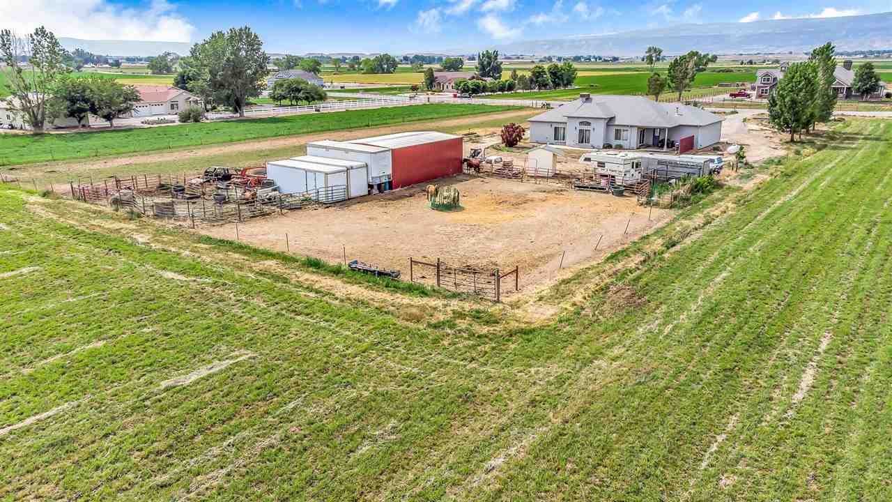 1356 Saddle Ridge Road Loma, CO 81524 - Photo 31 of 37 an aerial view of a house with big yard