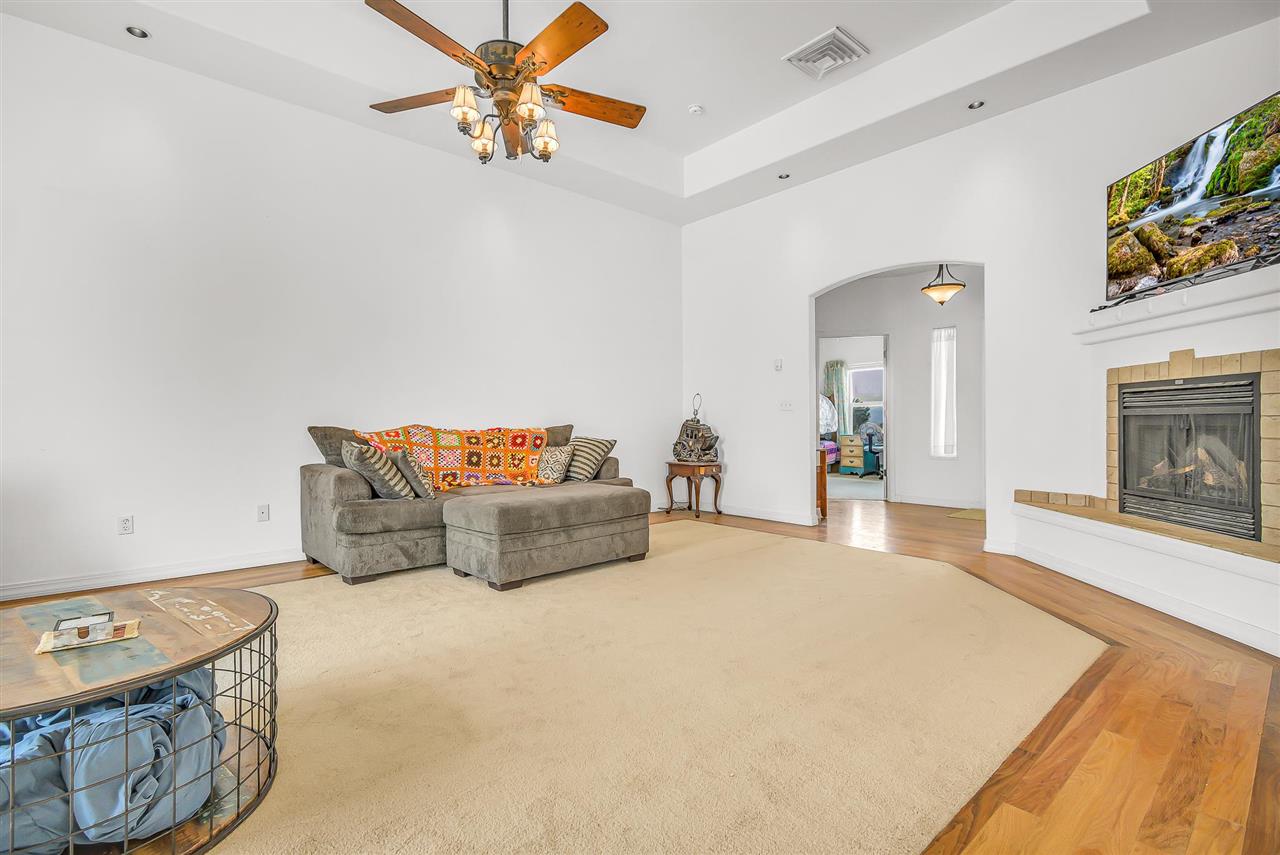1356 Saddle Ridge Road Loma, CO 81524 - Photo 10 of 37 a living room with furniture and a fireplace