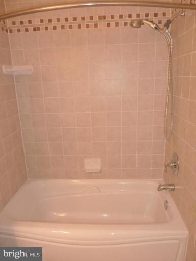 2118 Military Road Arlington, VA 22207 - Photo 8 of 17 Hall bath with custom tiled shower