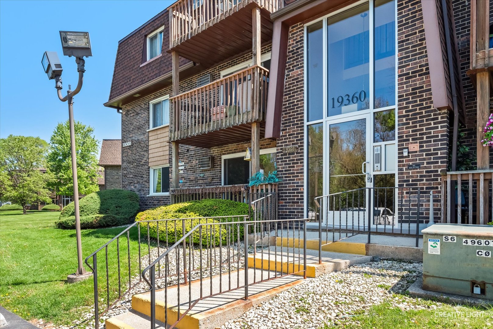 19360 Wolf Road, Unit 9 Mokena, IL 60448 - Photo 1 of 16 a view of a house with a backyard