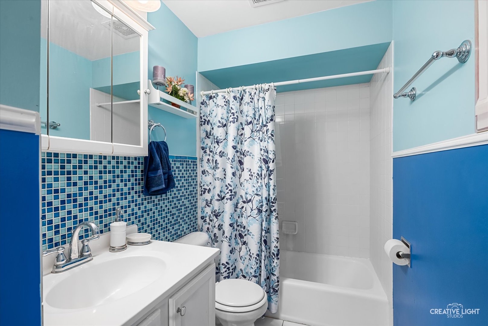 19360 Wolf Road, Unit 9 Mokena, IL 60448 - Photo 10 of 16 a bathroom with a sink toilet and shower