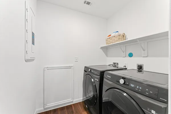 a utility room with dryer and washer