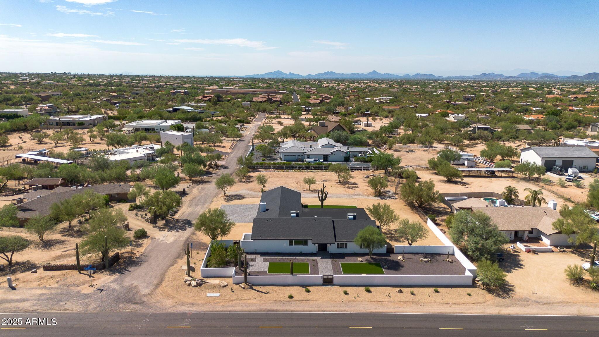 5219 East Lone Mountain Road Cave Creek, AZ 85331 - Photo 83 of 88 an aerial view of residential houses with city view