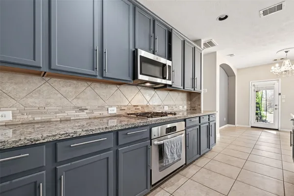 a bathroom with a tub and a shower