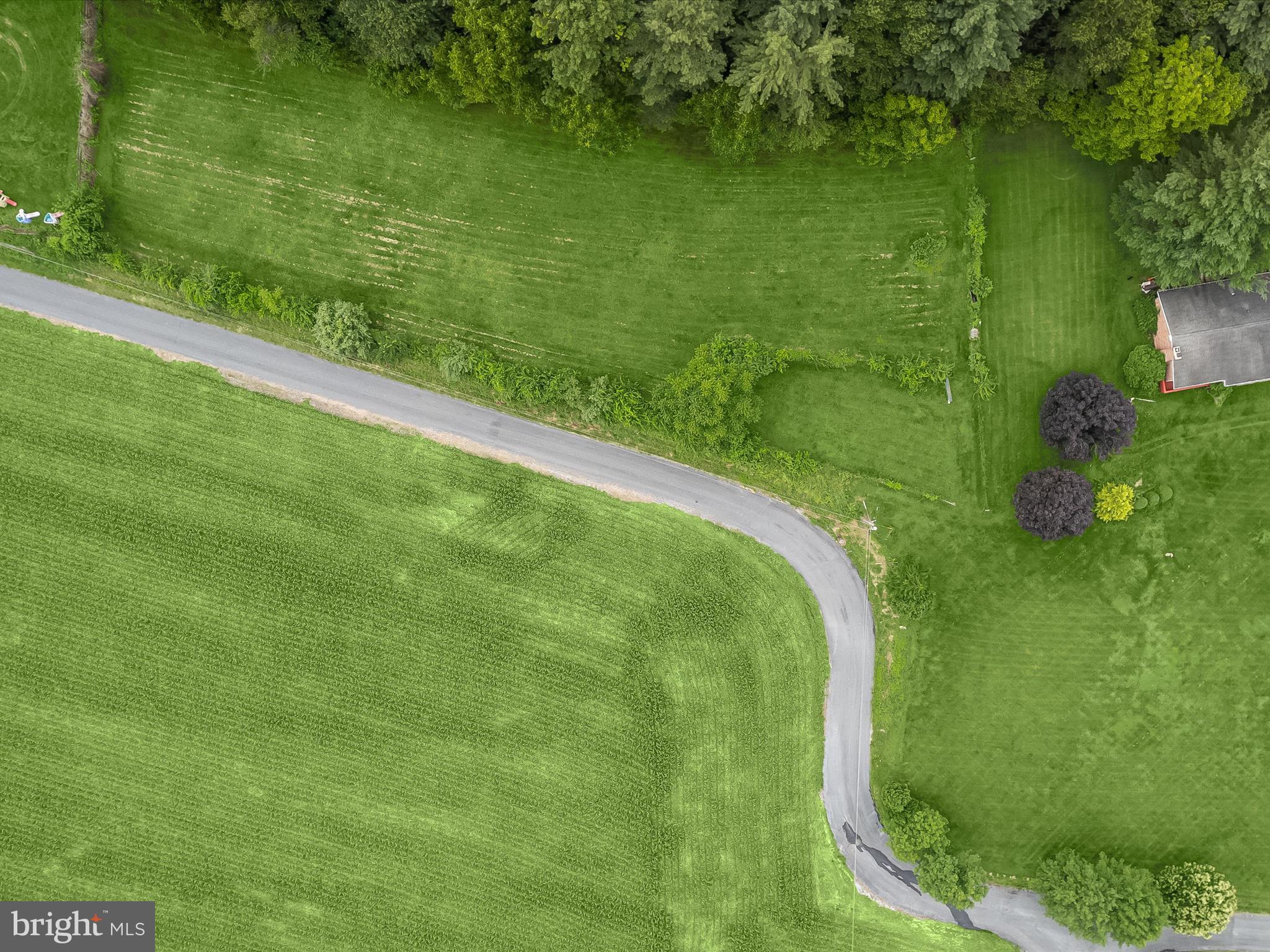 4704 Baughman Mill Road Manchester, MD 21102 - Photo 2 of 64 a view of a lake from a yard